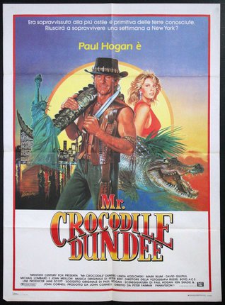 a movie poster of a man holding a crocodile