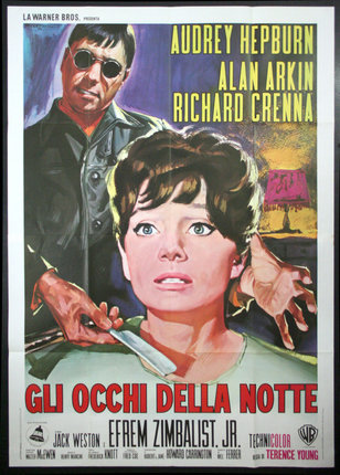 a movie poster of a woman with a knife