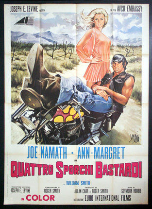 a movie poster of a man and woman on a motorcycle