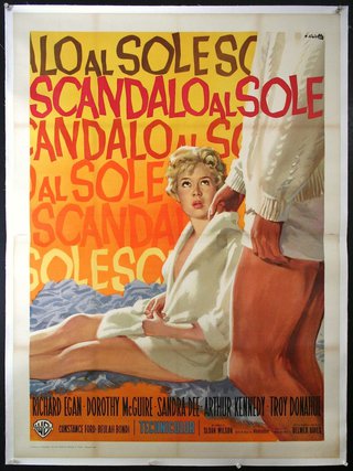a movie poster of a woman sitting on a bed