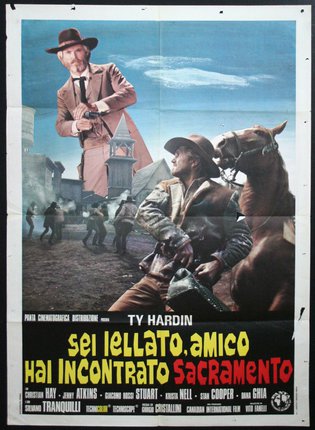 a movie poster with a man holding a gun and a horse