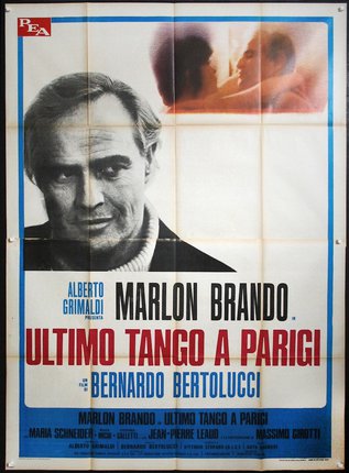 a movie poster with a man in a sweater