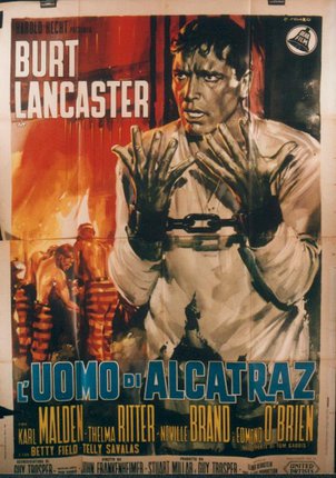 a movie poster with a man in chains