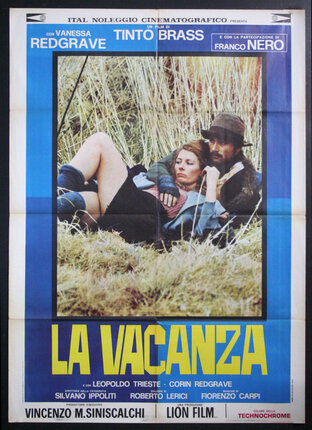 a movie poster of a man and woman lying on grass