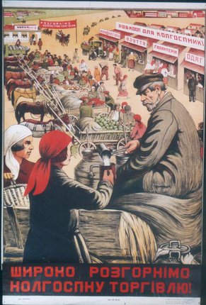 a woman selling food to a man