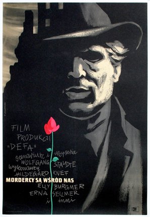 a poster of a man with a hat and a flower