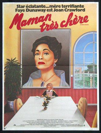 a poster of a woman sitting at a table