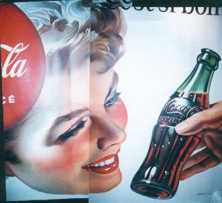 a close-up of a woman's face and a bottle of soda