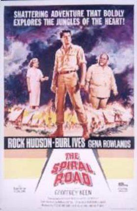 a movie poster of a man standing on a fire