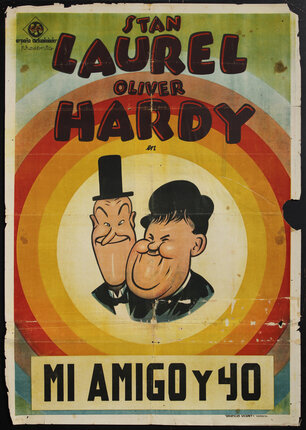 a poster with cartoon caricatures of Stan Laurel & Oliver Hardy in the center of a a radiant circle of colors