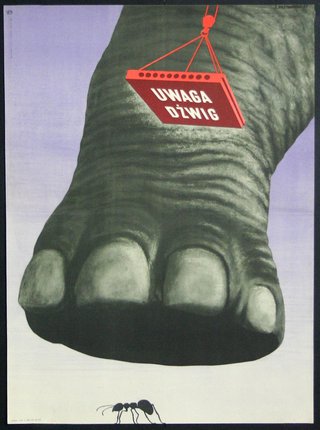 an elephant foot with a sign