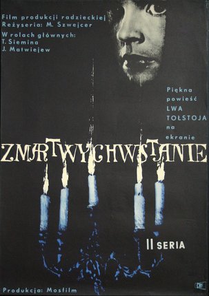 a poster with a man's face and candles