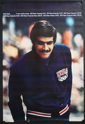 a man with mustache wearing a blue jacket