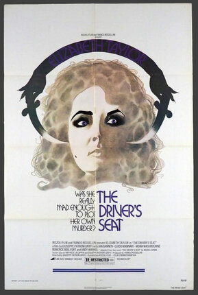 a poster of a crazed looiking woman with a torturous looking headband