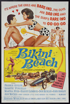 a poster of a man and woman on the beach