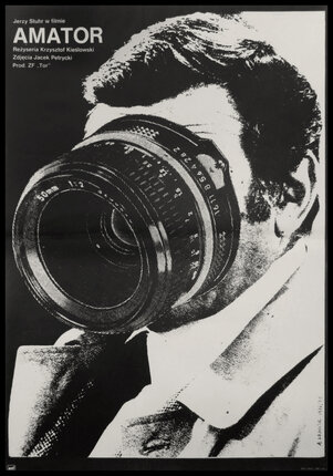 a man with a camera lens