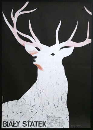 a white deer with pink antlers