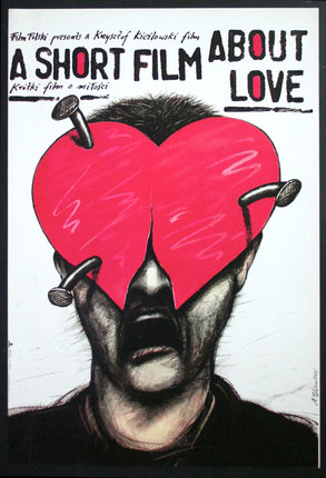 a poster of a man with a heart shaped object
