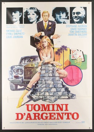 a movie poster with a man and woman on a pyramid of gold bars