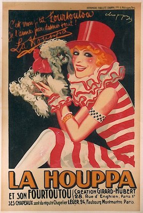 a woman in a red hat holding a poodle