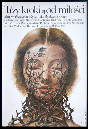 a poster with a woman's face covered with vines