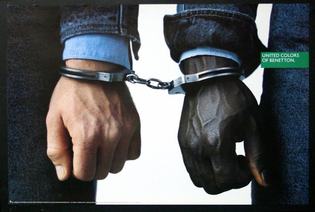 a close up of hands in handcuffs