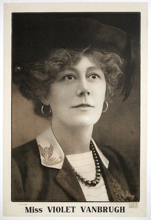 a woman wearing a hat and necklace