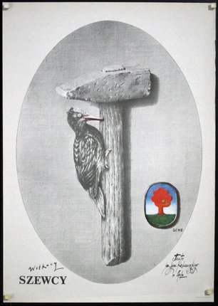 a bird on a wooden post