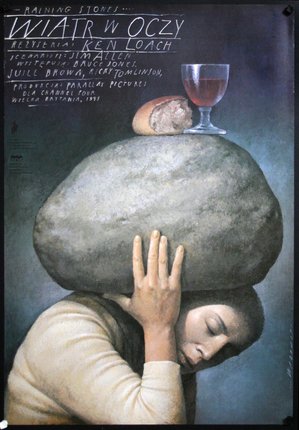 a poster of a woman carrying a rock on her head