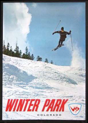 a poster of a skier jumping in the air