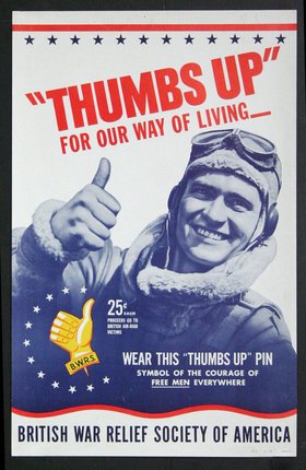 a man wearing a helmet giving a thumbs up