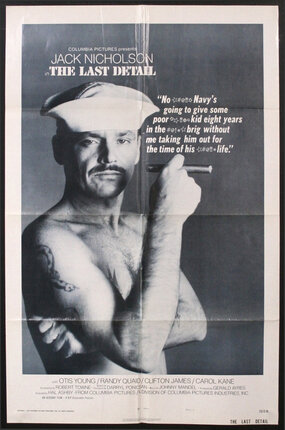 a poster of a man holding a pen
