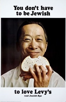 a man holding a sandwich