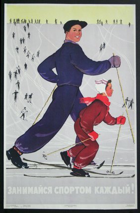 a man and child skiing