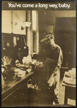 a woman standing in a kitchen