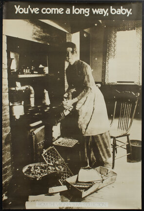 a woman standing in a kitchen