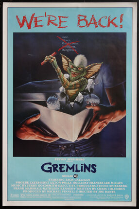 movie poster with a gremlin in a box
