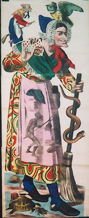 a woman holding a snake and a stick