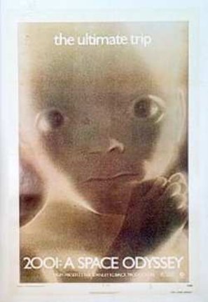 a baby's face with a hand on its chin