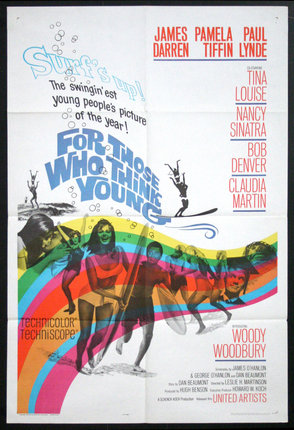 a movie poster with a rainbow and people on it