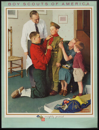 a family helping a boy scout put on his uniform