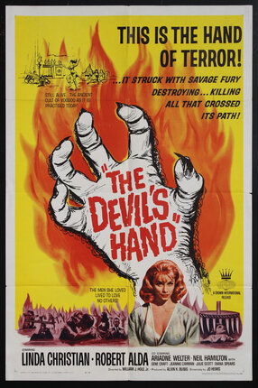 horror movie poster with a clawed hand in fire and a woman below