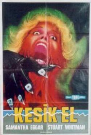 a movie poster of a woman with a red hair and a black hand