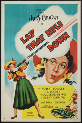 a movie poster of a woman holding a rifle