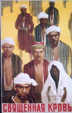 a group of men wearing white headdresses