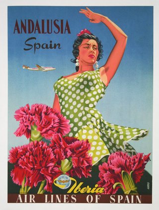 a woman dancing in a green dress with a flower in her hair