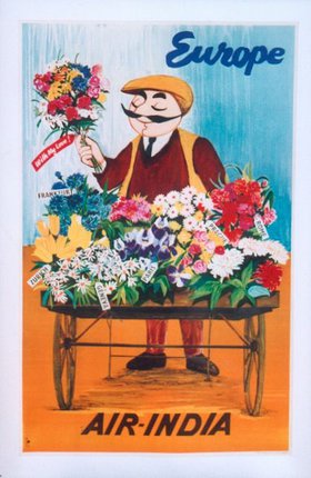 a man holding a cart full of flowers