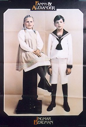 a boy and girl in sailor clothes