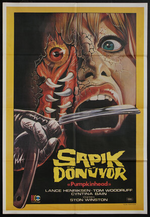 a movie poster of a woman eating a knife