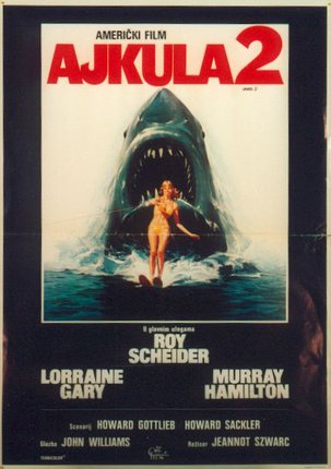 a movie poster with a woman in the water and a shark